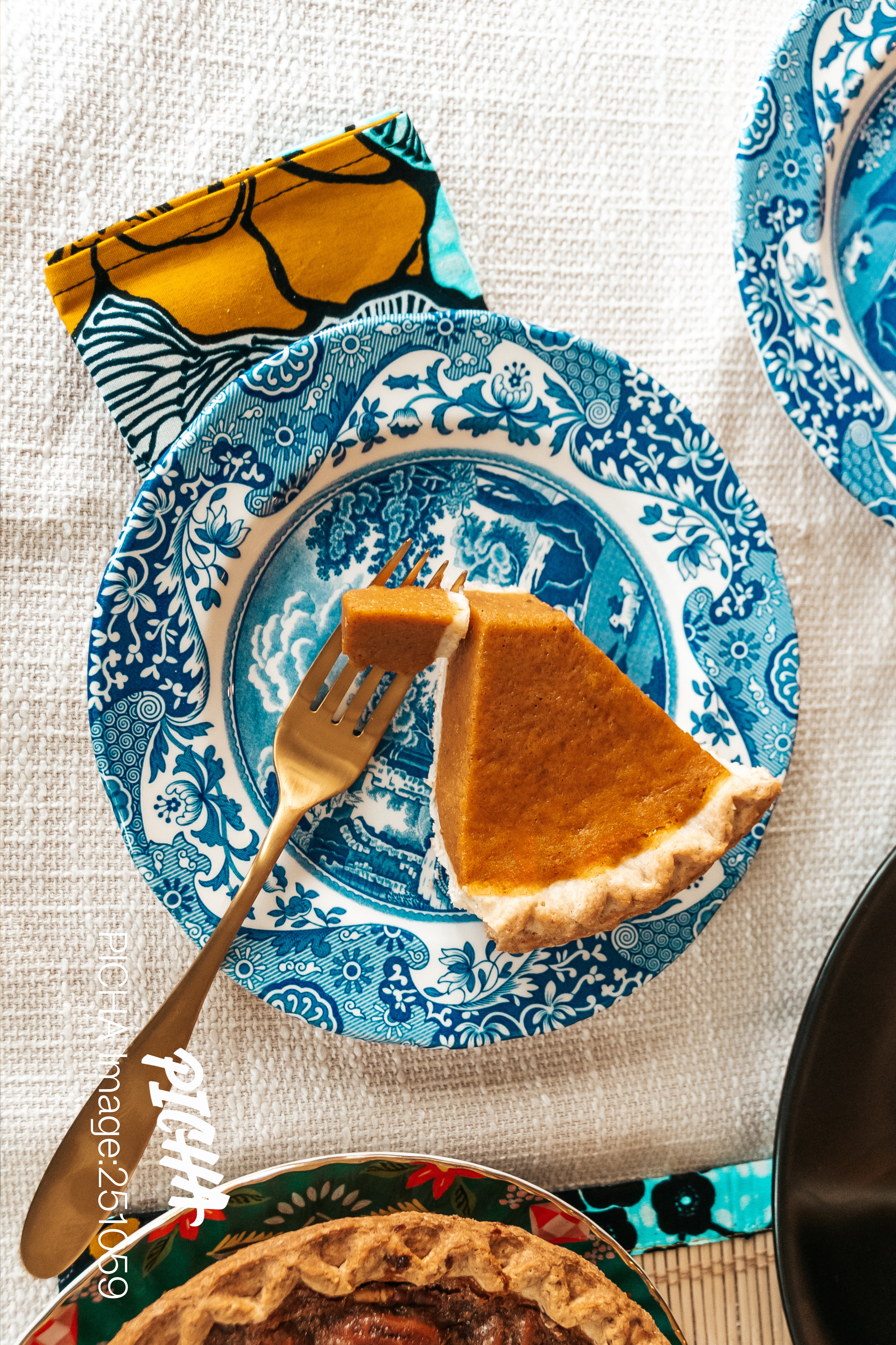 Holiday table with homemade pumpkin pie and pecan pie desserts